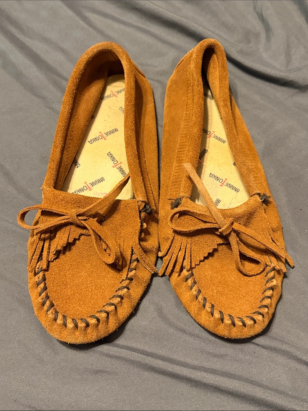 Minnetonka Suede Fringe Moccasins in Cognac Brown